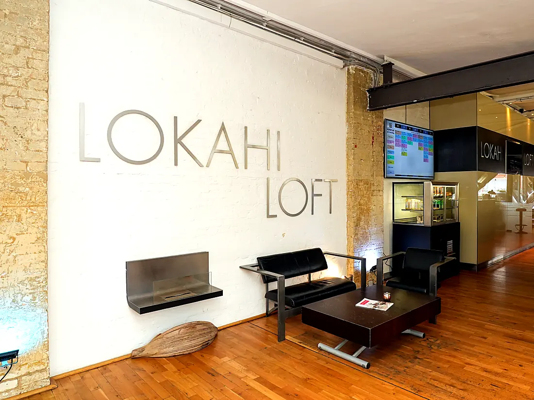Reception area with the Lokahi Loft sign