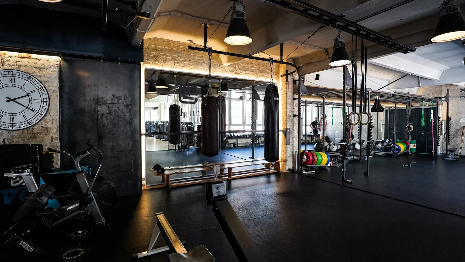 Training floor with functional rig, punching bags and Cross Circle area at Lokahi Loft Berlin
