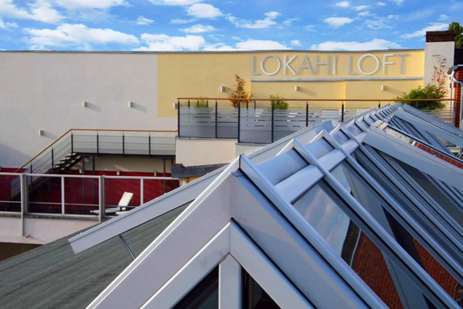 LOKAHI LOFT roof terrace with glass roof and view over the Berlin rooftops